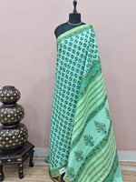 A mint green mulmul zari cotton saree 