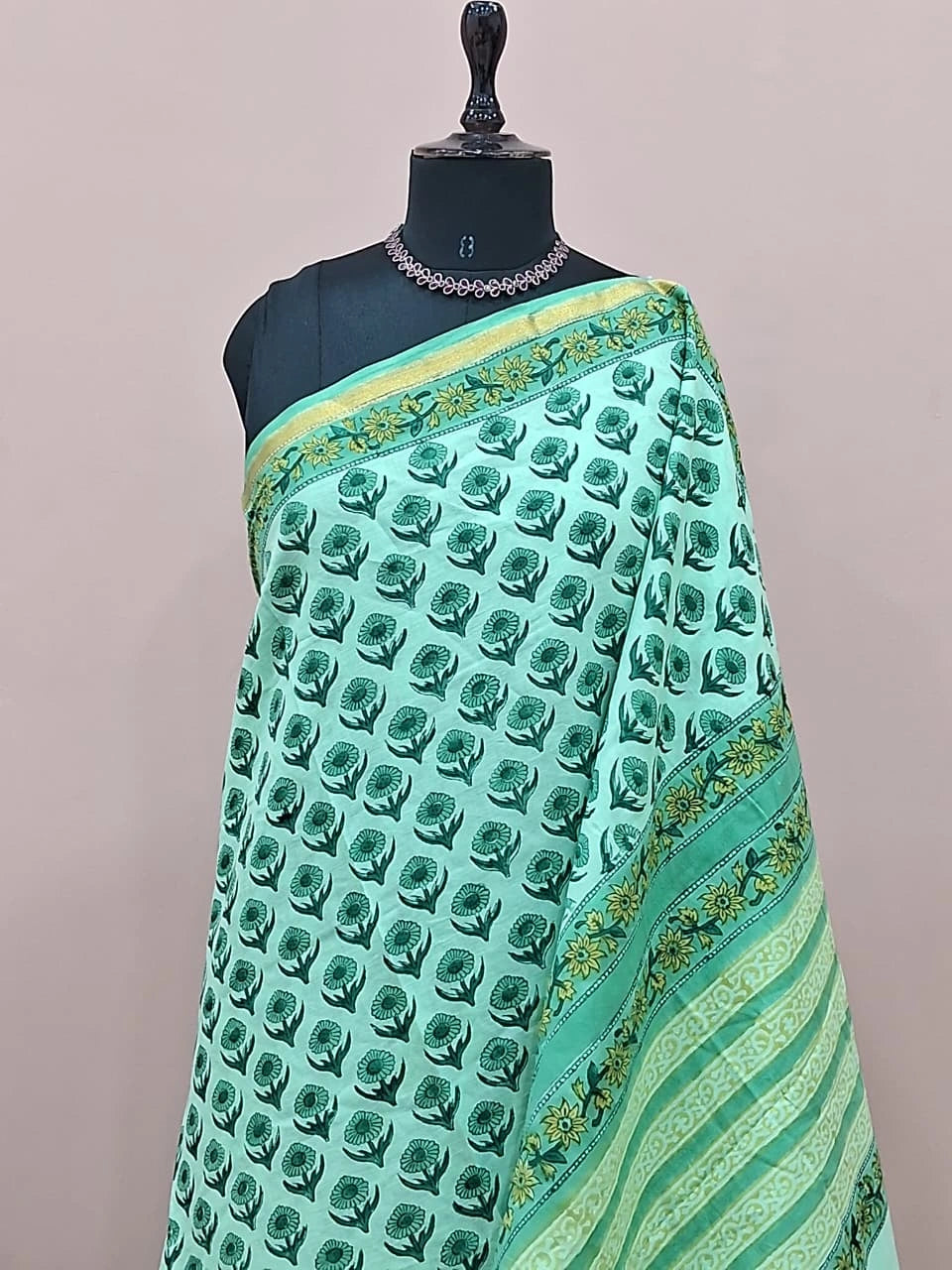 A mint green mulmul zari cotton saree 1