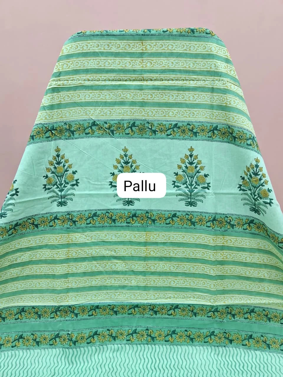 A mint green mulmul zari cotton saree pallu