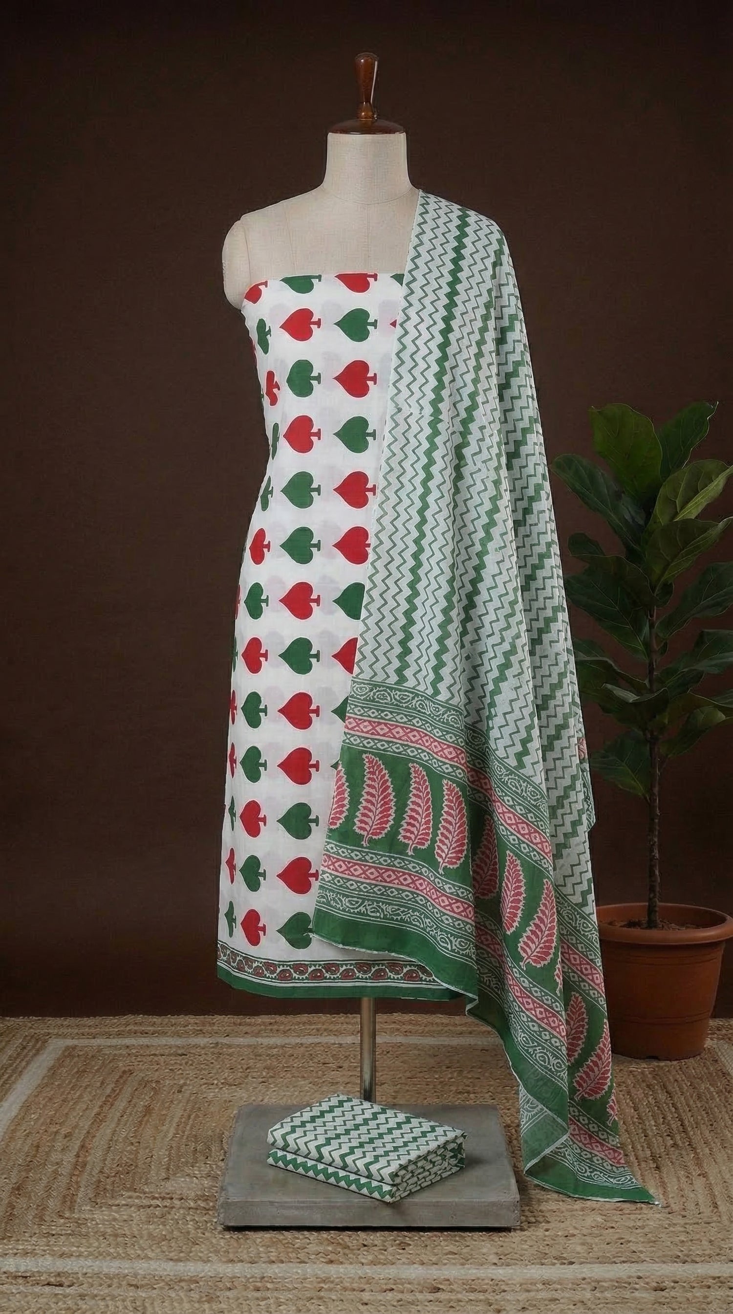 White with Red and Green spade printed cotton dress material